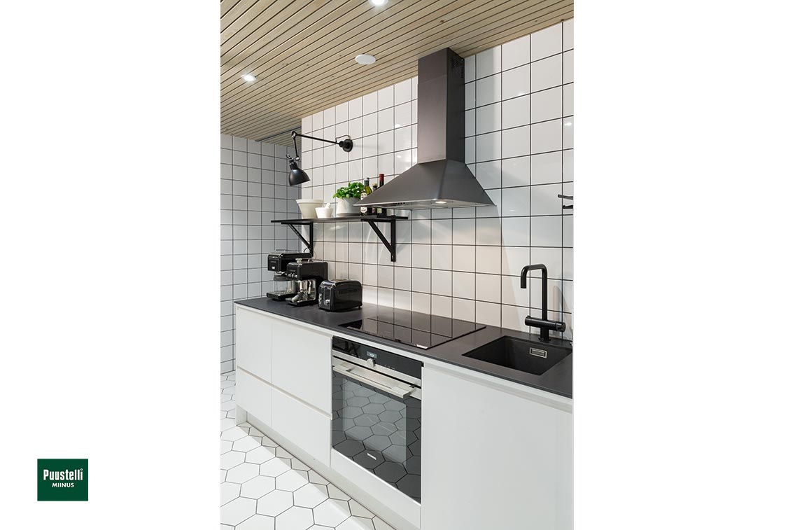 Puustelli Miinus ecological handleless kitchen with birch veneer white j-pull doors - cooking zone