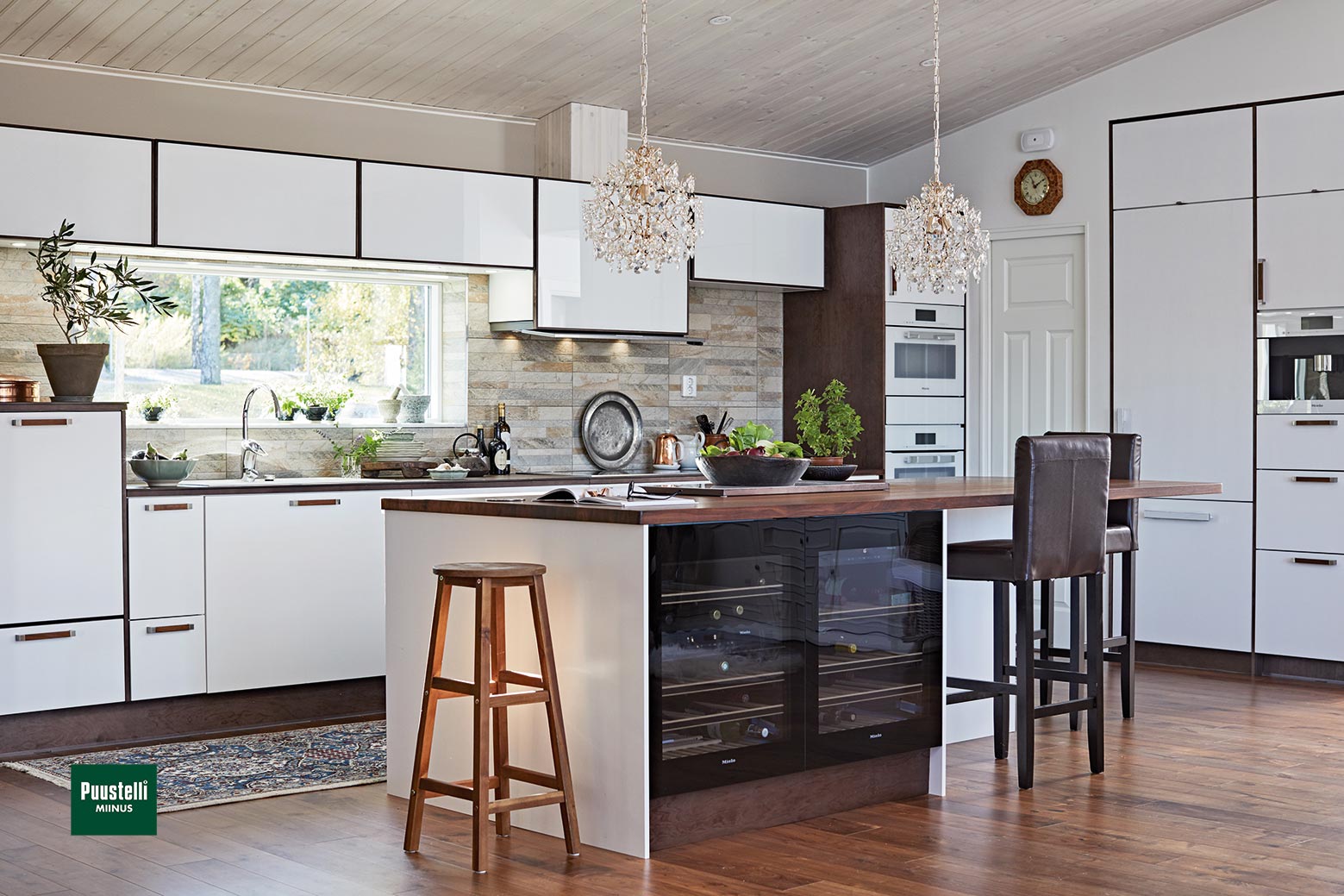 Puustelli Miinus ecological kitchen in white and lacquered dark brown birch veneer island view