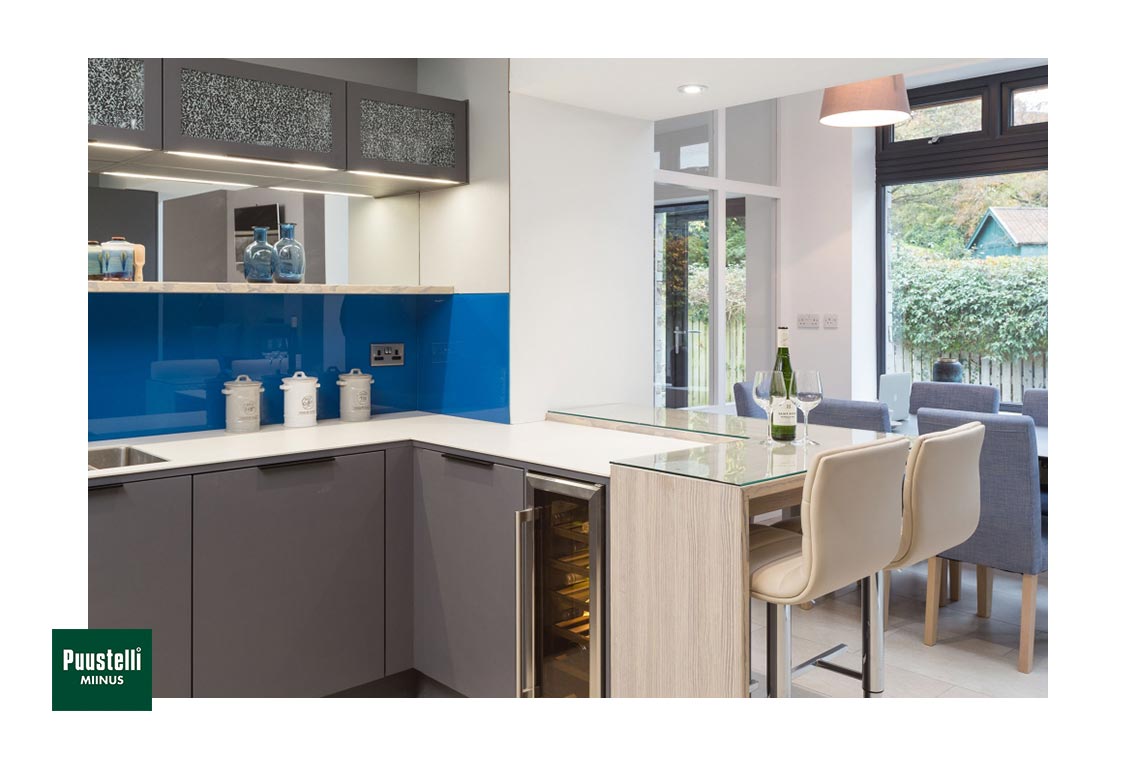Puustelli Miinus eco-friendly kitchen with dove grey painted birch veneer doors peninsula
