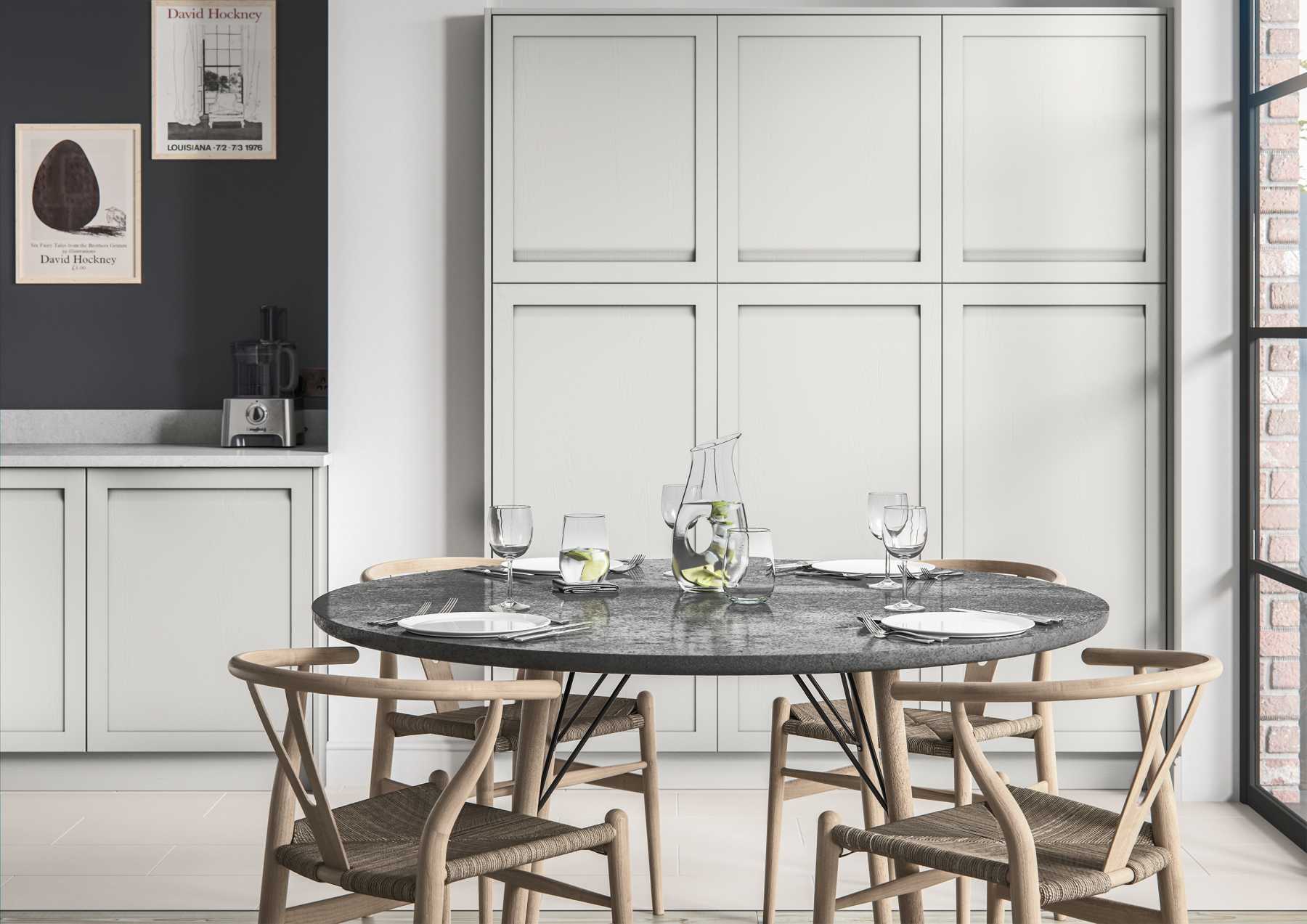 Contemporary handleless shaker style kitchen tall larder units painted matte light grey