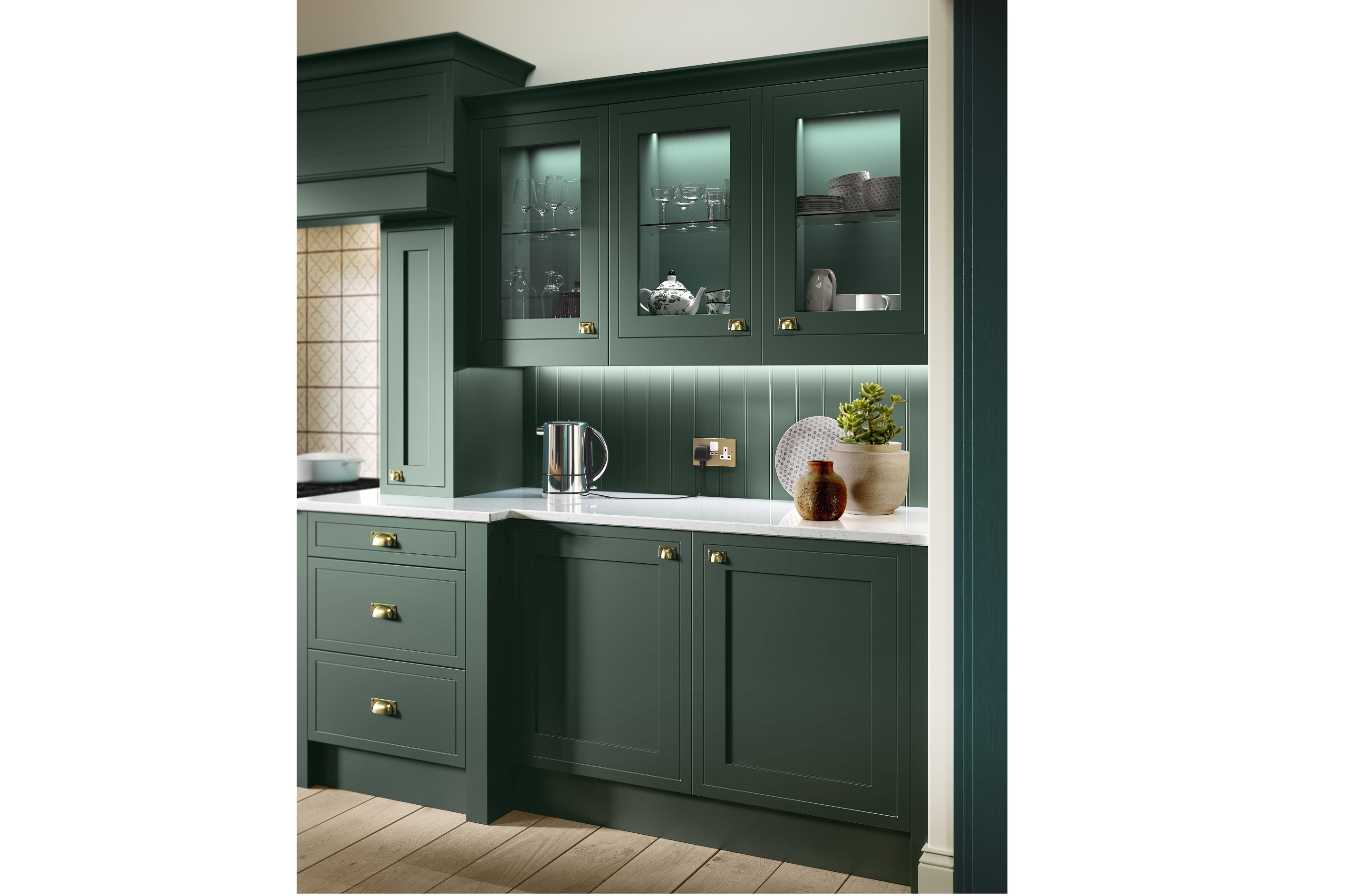 Mock In-Frame Shaker-Style Kitchen Painted Heritage Green featuring shaker doors with glazed panels and Silestone quartz worktop