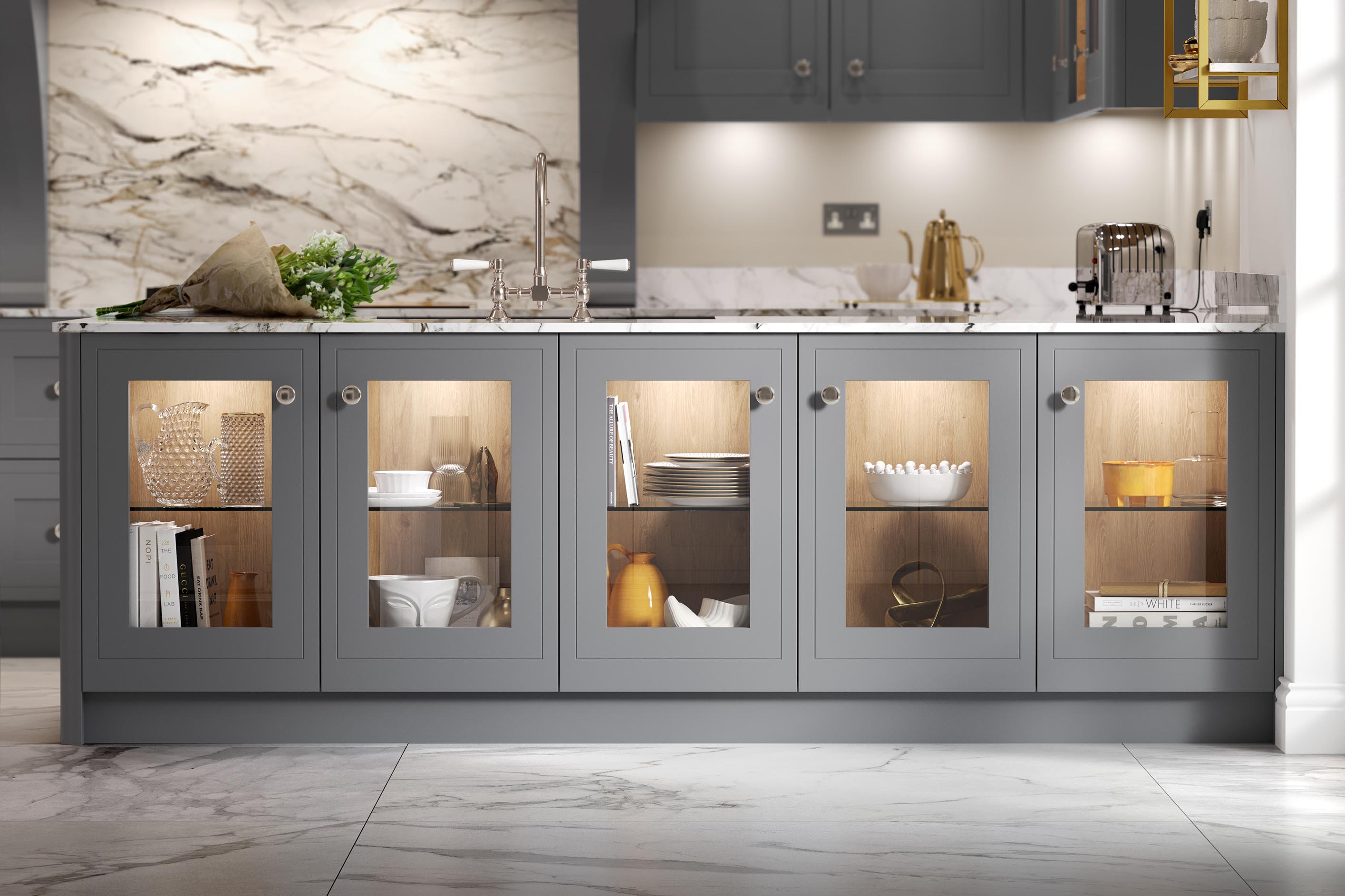 Smooth-finish shaker-style kitchen painted dust grey featuring under-counter storage and warm LED lighting