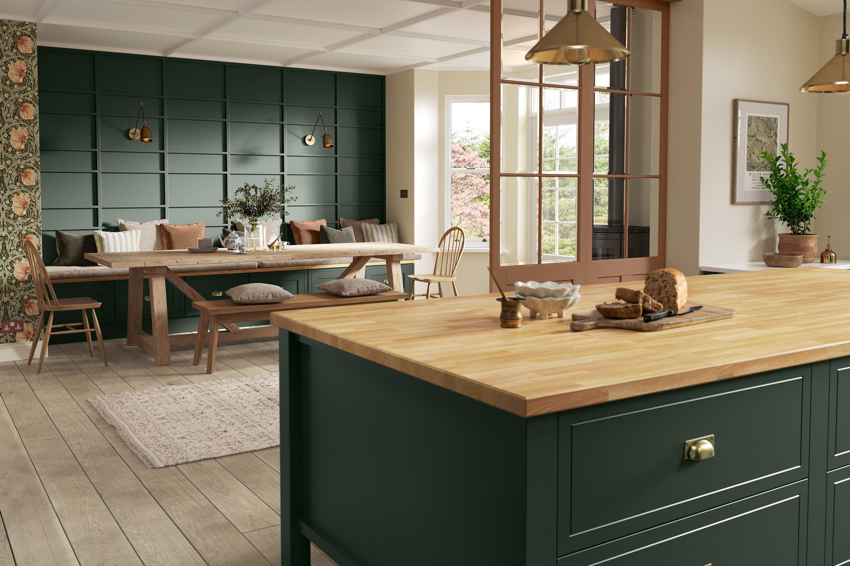 Mock In-Frame Shaker-Style Kitchen Painted Heritage Green featuring partially glazed partitions which create two distinct living areas while maintaining option for open-plan living 