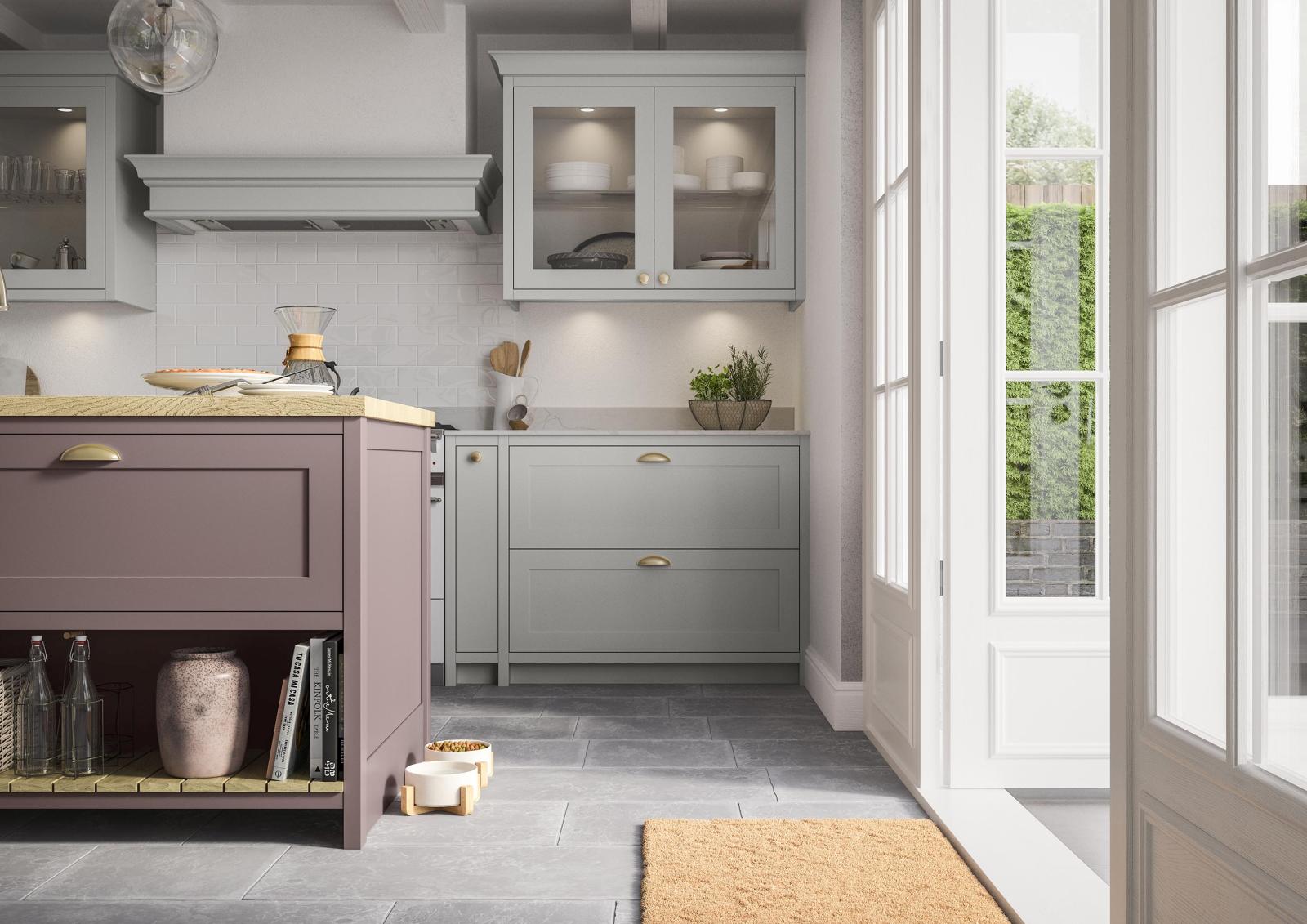 Smooth-finish, slim-frame, shaker-style kitchen painted vintage pink and light grey featuring LED lighting in cabinets to create warmth and ambiance 