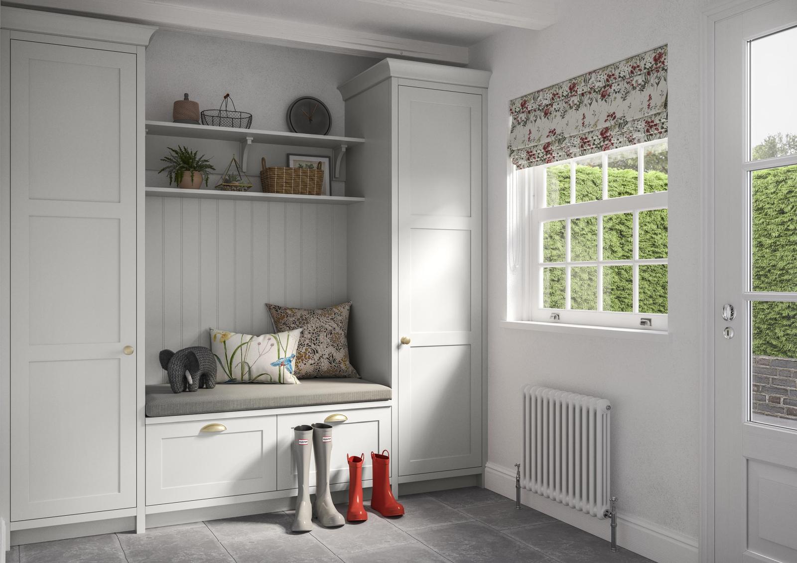 Smooth-finish, slim-frame, shaker-style kitchen painted vintage pink and light grey with adjoining utility storage room