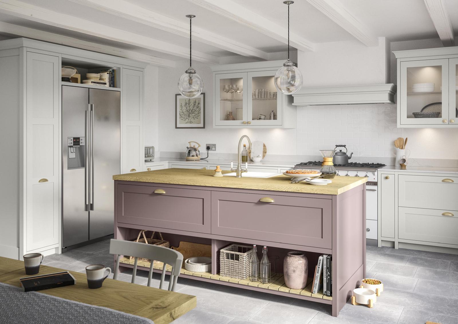 Smooth-finish, slim-frame, shaker-style kitchen painted vintage pink and light grey featuring central island unit, american fridge freezer, range cooker and canopy housing a recessed extractor fan