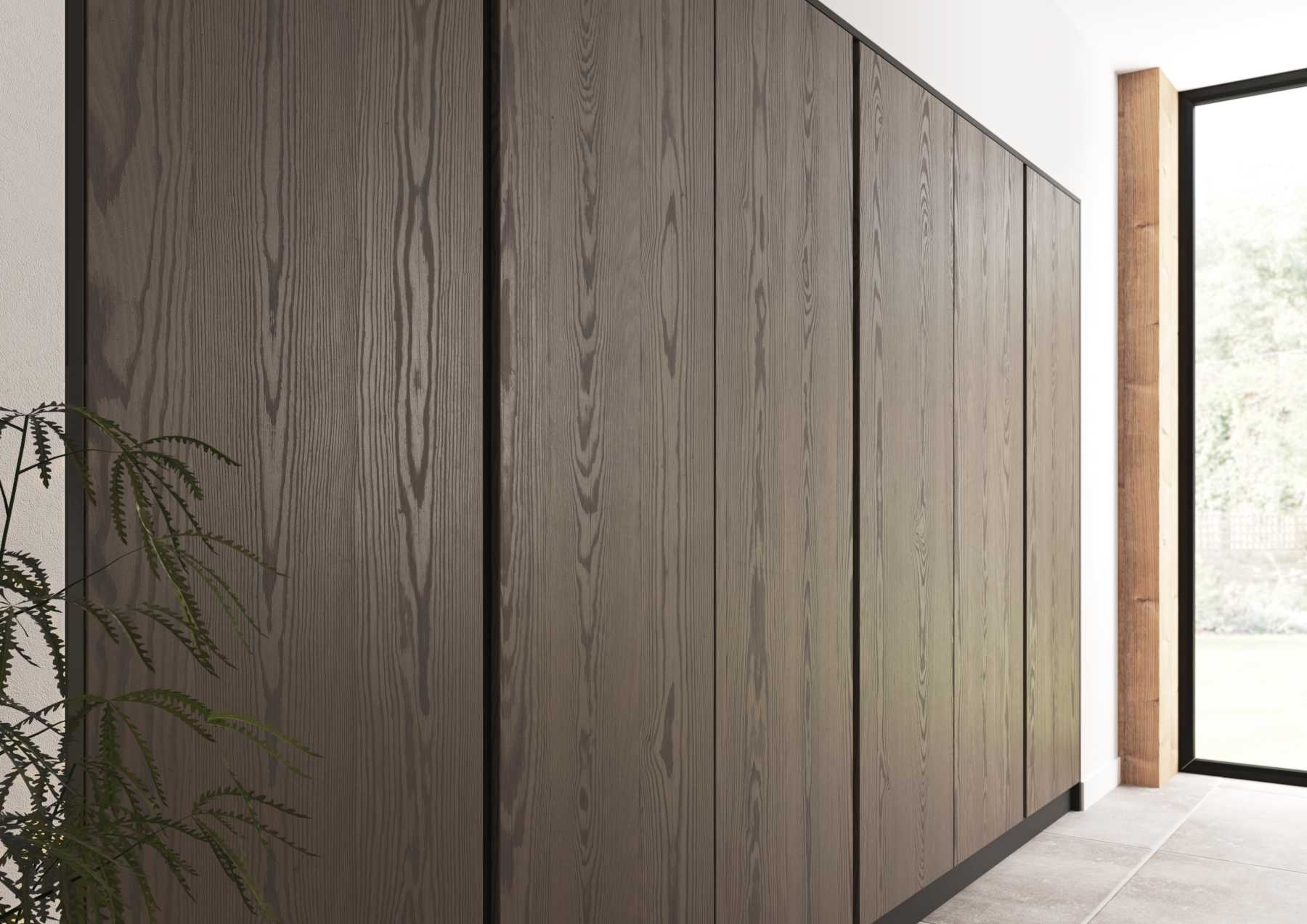 true handleless kitchen tall units with ash veneer doors stained truffle grey