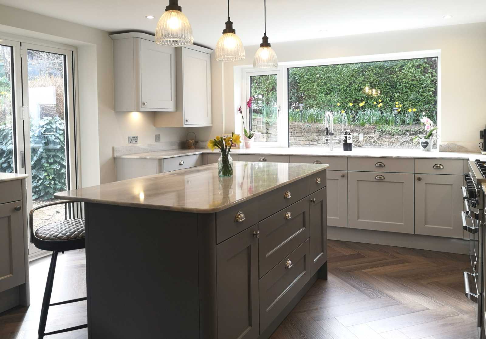 beaded shaker style kitchen painted light grey with dust grey island drawer side