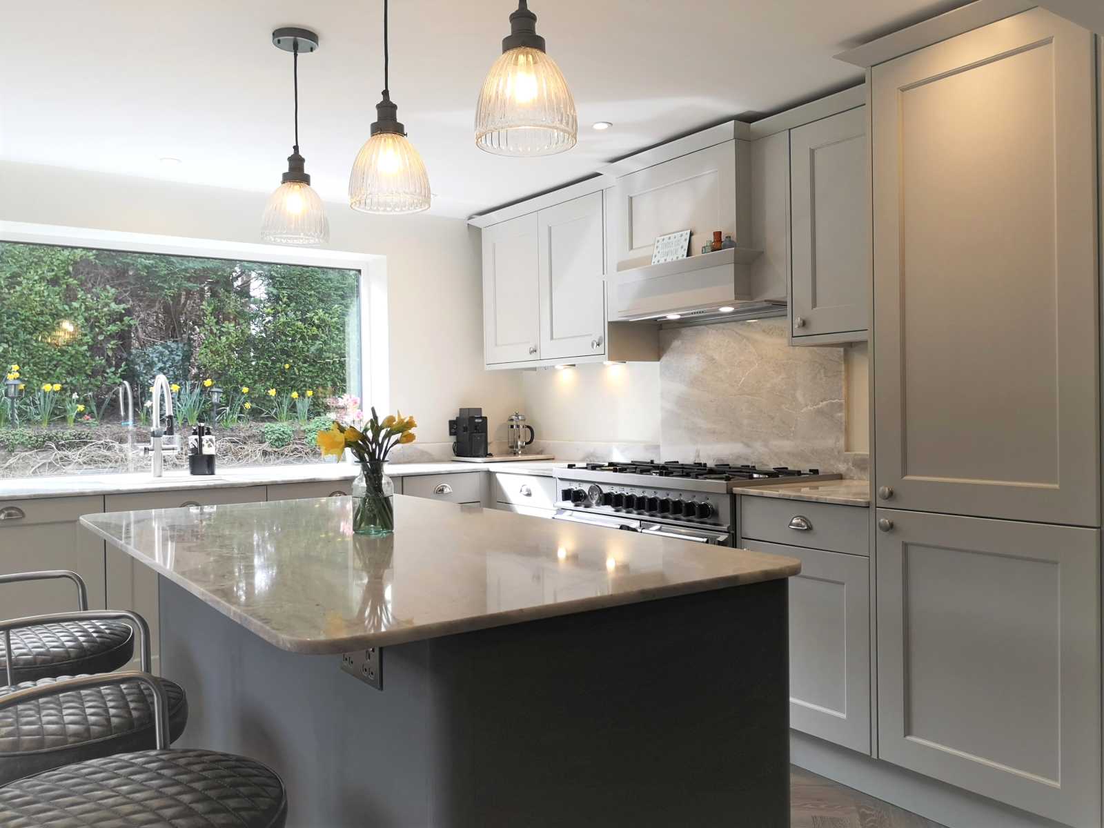 beaded shaker style kitchen painted light grey with dust grey island seating side