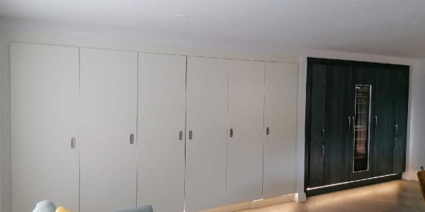 Bi-fold pivot pocket doors