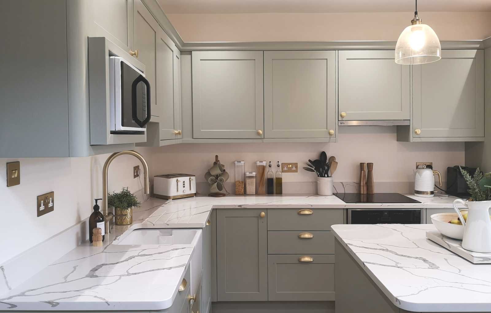 contemporary shaker style solid wood kitchen showing customer wall microwave cabinet