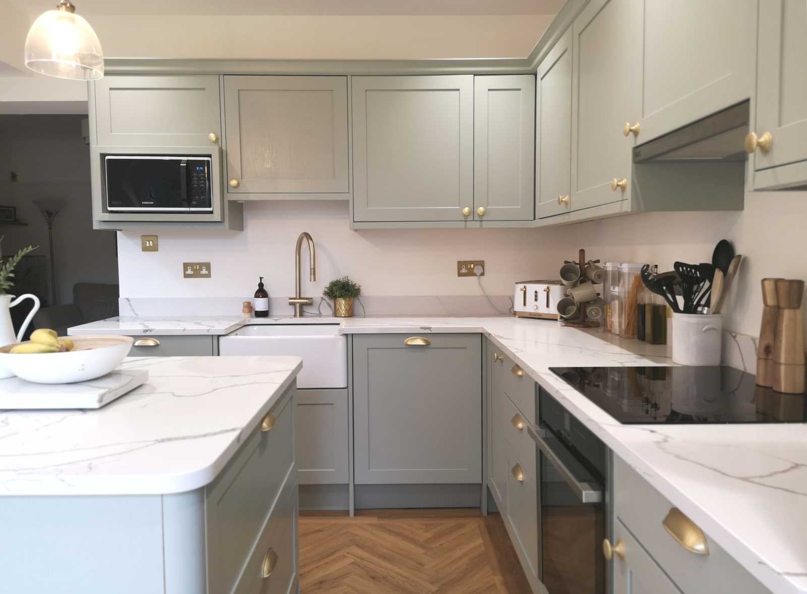 contemporary shaker style kitchen showing Neff slide-n-hide oven and induction hob