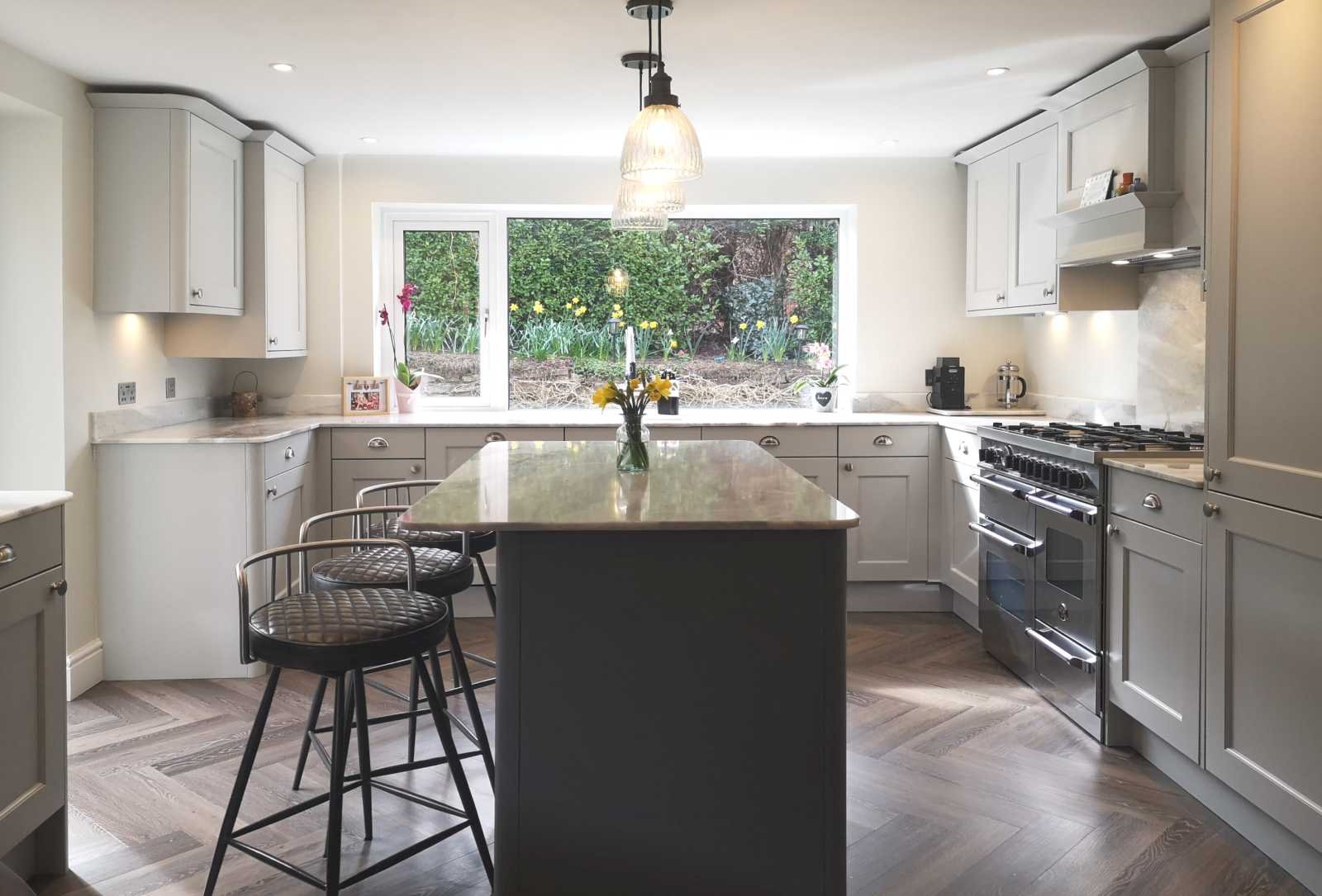 beaded shaker style kitchen painted light grey with dust grey island end on