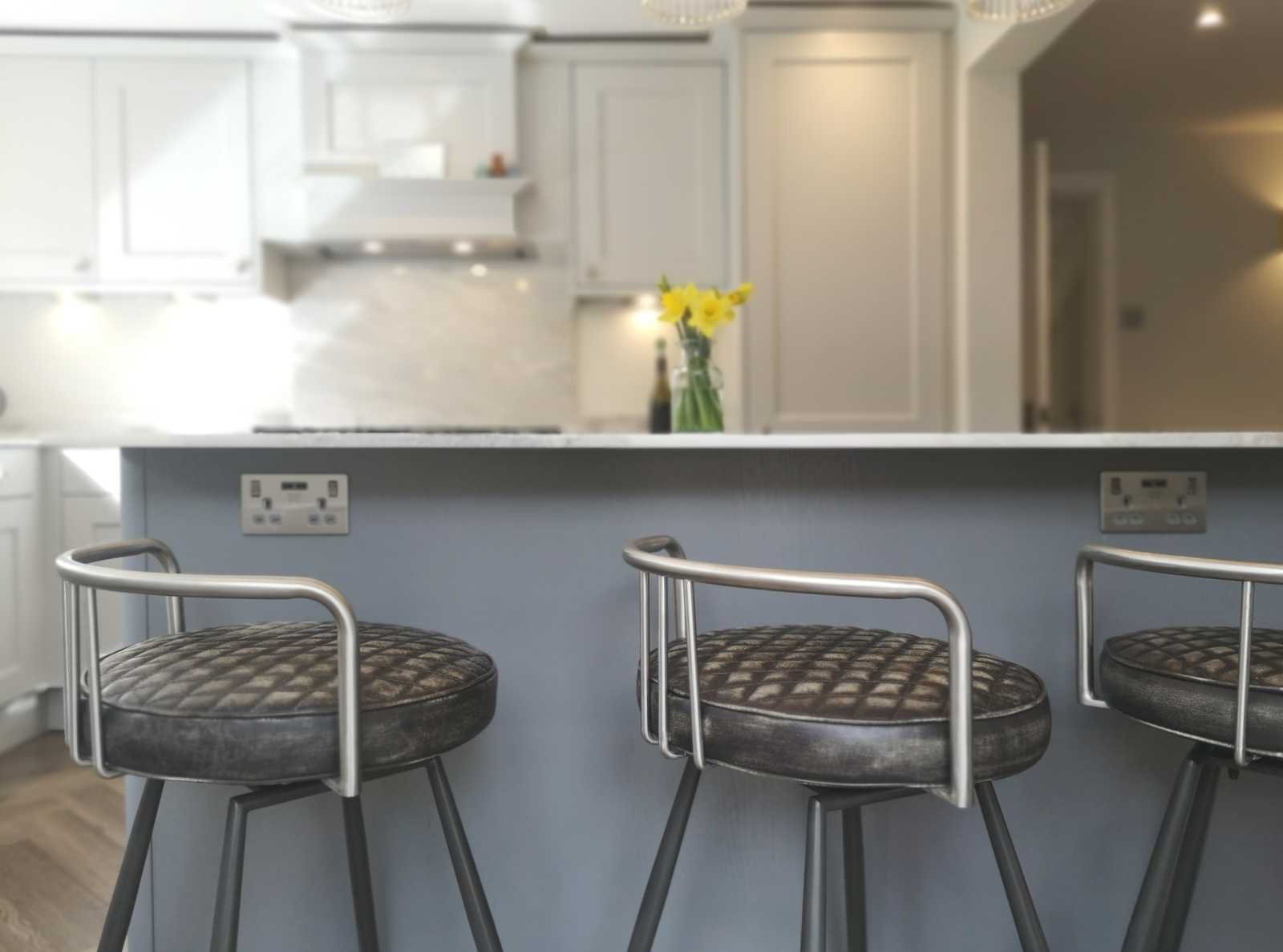 island painted dust grey with bar stool seating